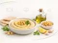 Pyszny hummus z ciecierzycą, oliwą i cytryną. Czy hummus jest zdrowy? Tak, to bogactwo białka i błonnika!